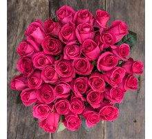 Букет из 21 ярко-розовой розы "Фуксия" (с оформлением)