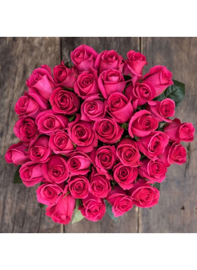 Букет из 21 ярко-розовой розы "Фуксия" (с оформлением)